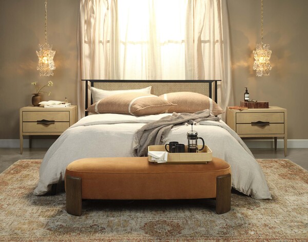 luxurious bed with ceenters of peach, burnt red and cream